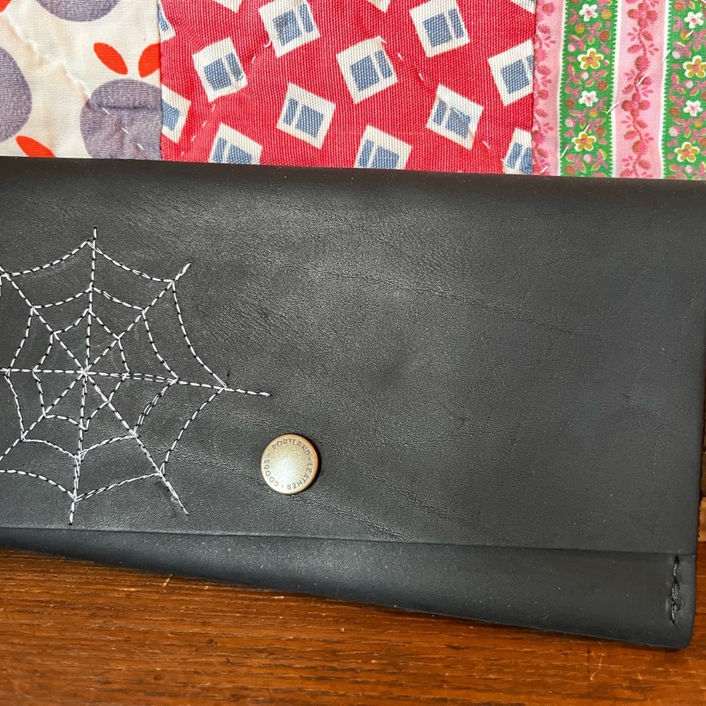 Portland Leather Smooth Black Wallet with Spider Web Design